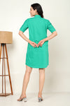 Green shirt dress with butterfly embroidery
